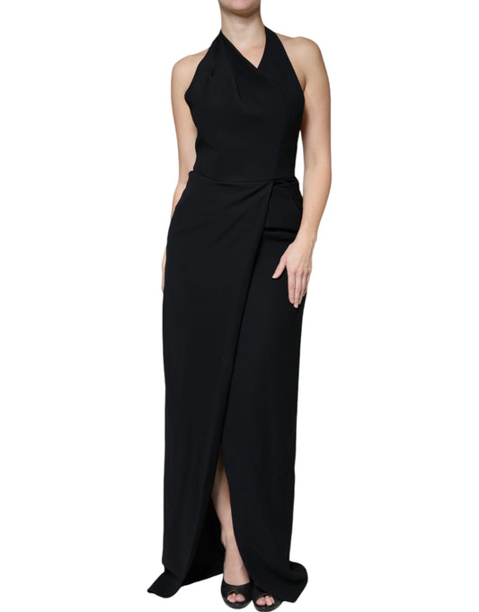 A black halter neck sleeveless gown dress with a sheath silhouette
