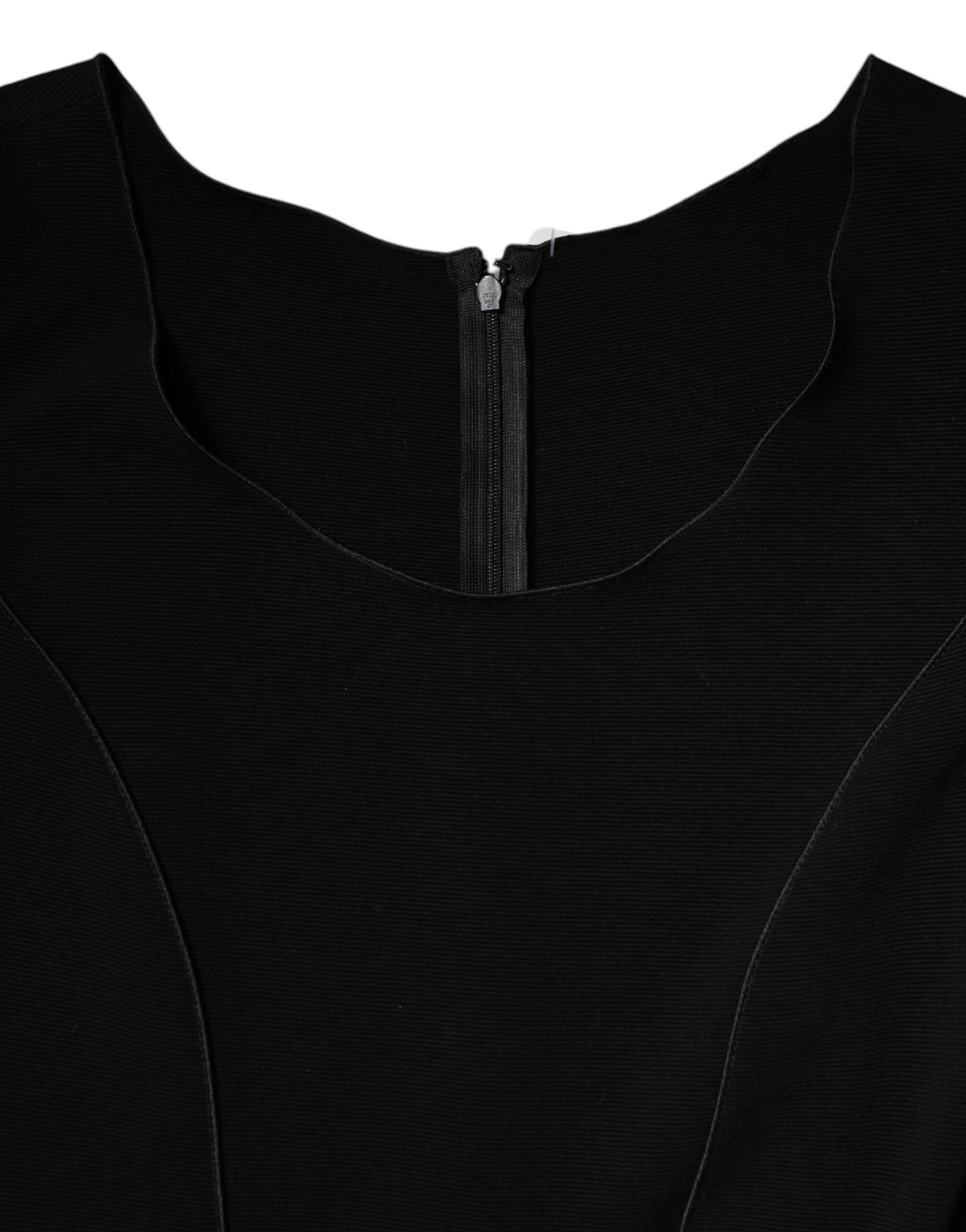 A black viscose midi dress with short sleeves and a zipper at the front