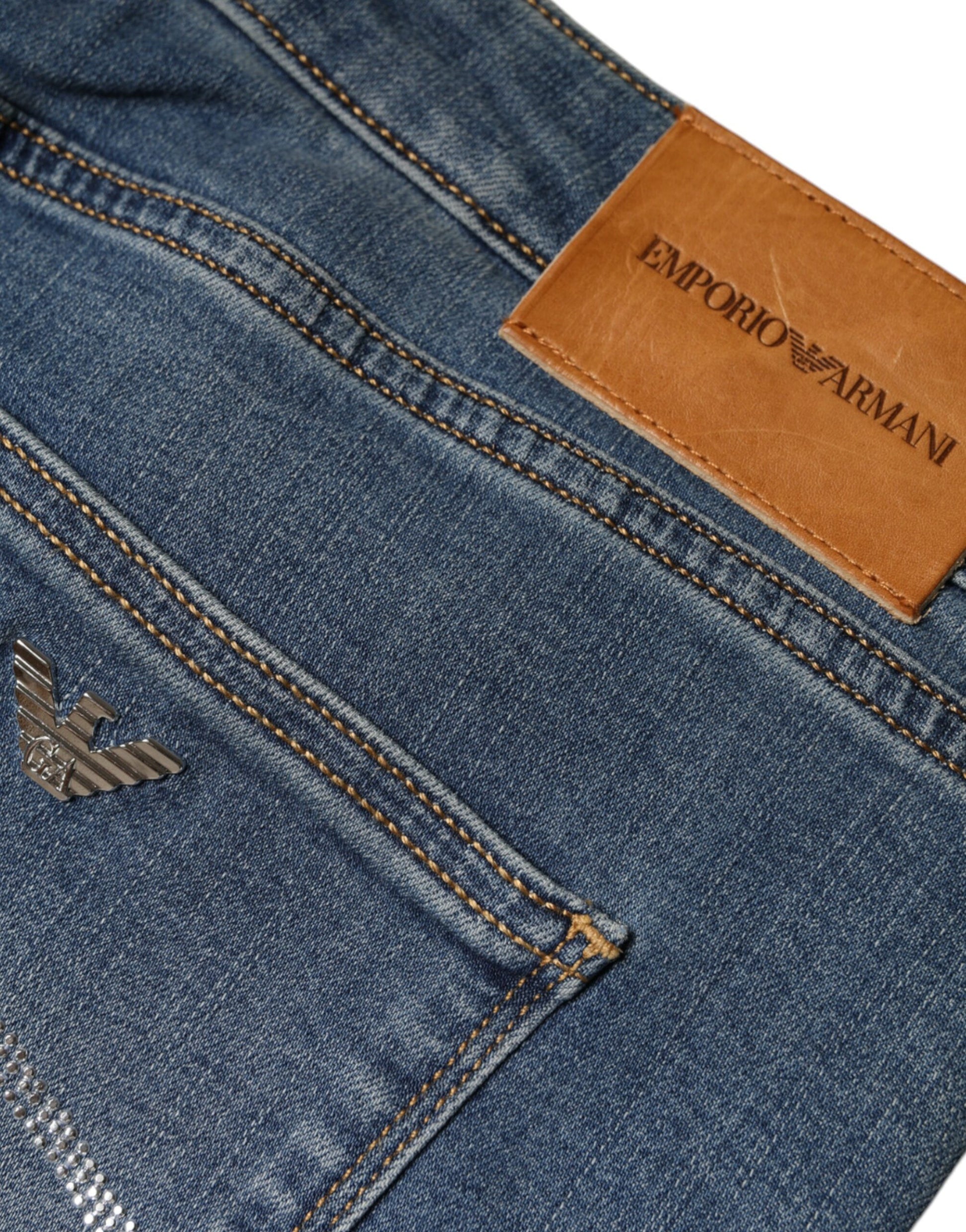 Blue jeans with brown leather patch on back pocket
