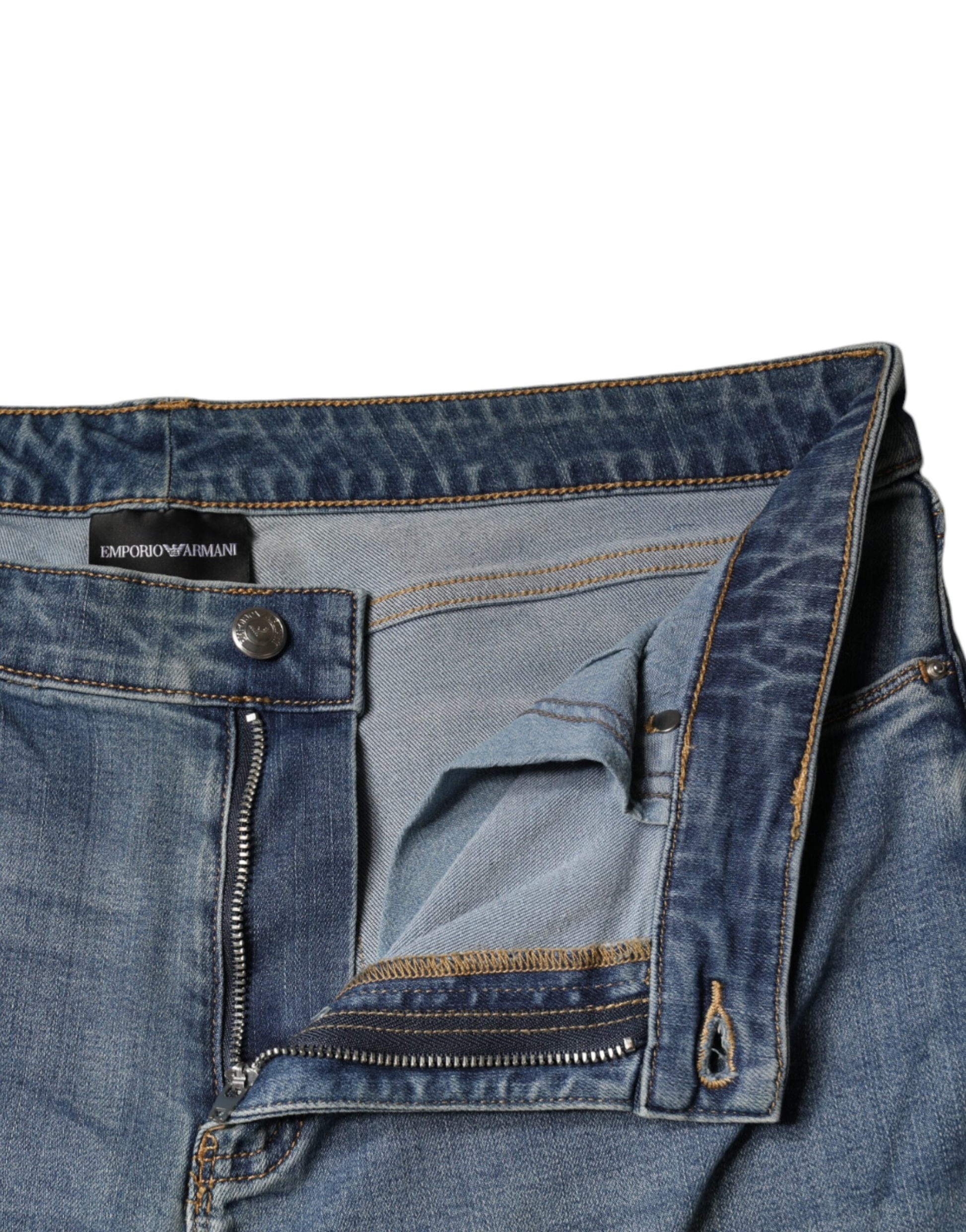 Blue denim jeans with zippered pockets