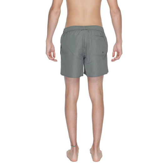 Men's green polyester swim shorts with elastic waistband, from Emporio Armani