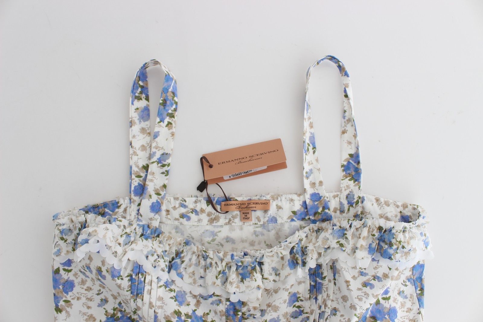 Floral patterned apron with ties at waist and neckline