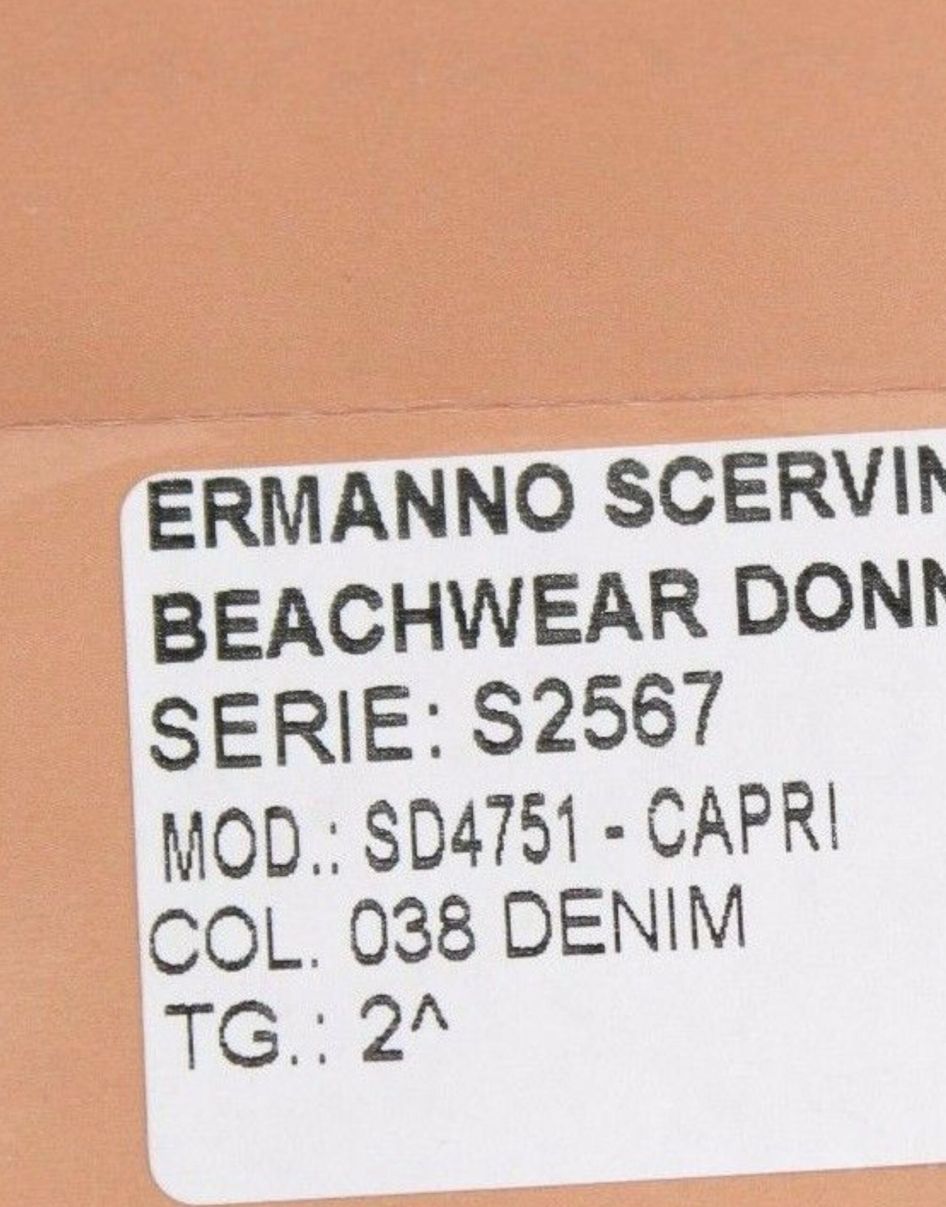 White label with black text on a brown package reading ERMANNO SCREZINI BEACHWEAR DONNA SERIE S256767