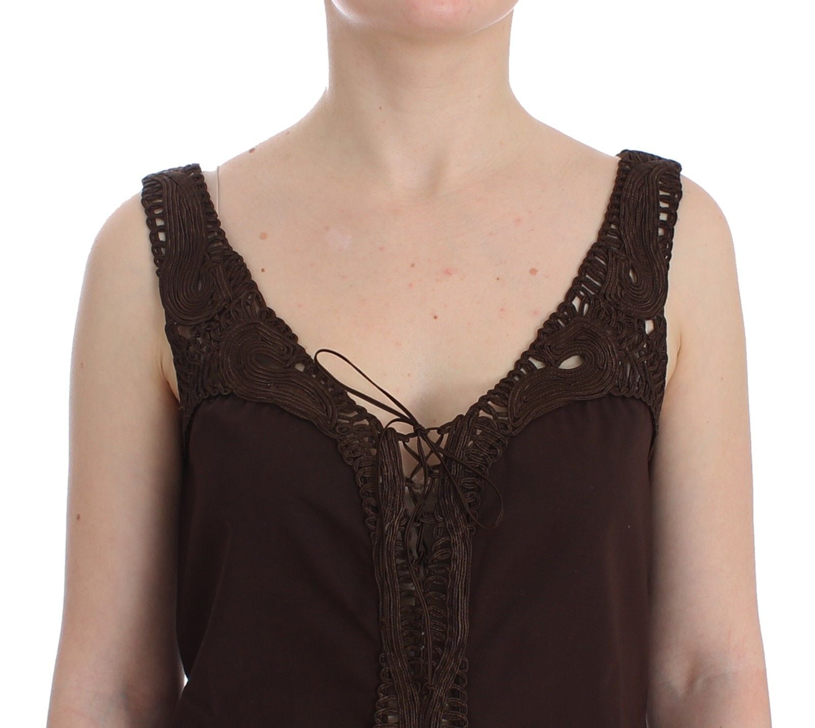 Brown crocheted top on woman's shoulders
