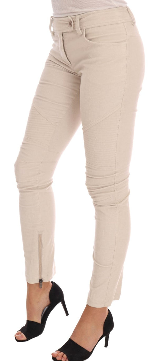 Woman wearing beige pants and black heels