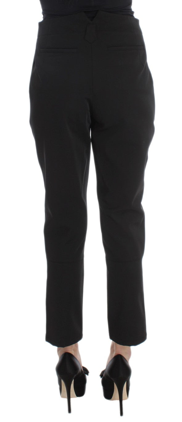 Pair of black trousers with a high waist and wide legs