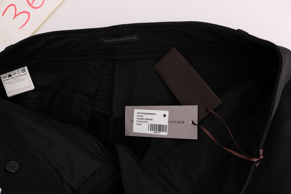 Black pants with tags on them