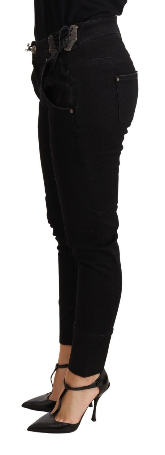 Woman wearing black pants and high heels