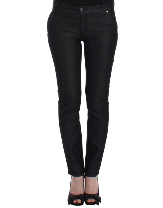 A pair of black skinny jeans on a mannequin