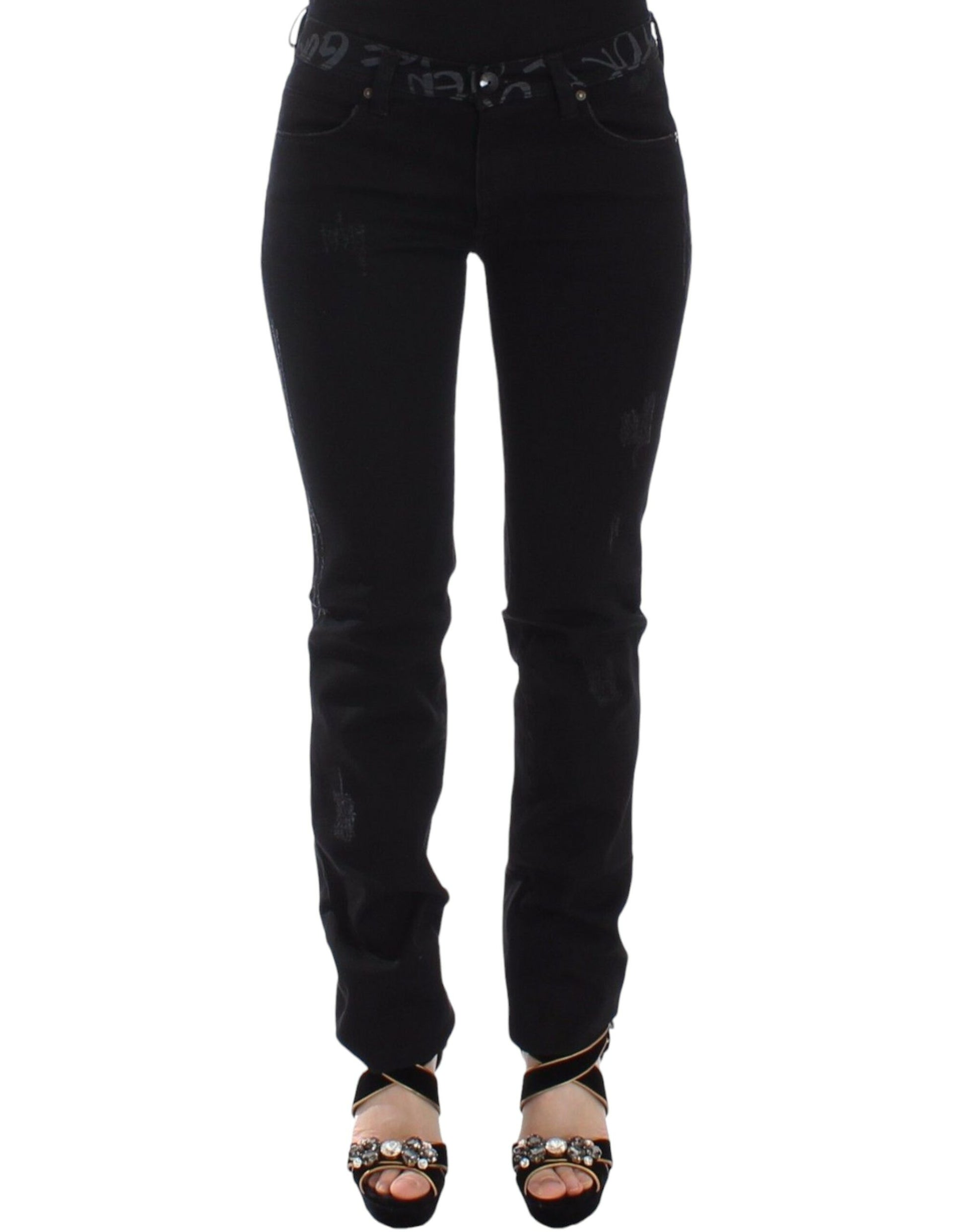 Pair of black skinny jeans with zipper detailing on legs