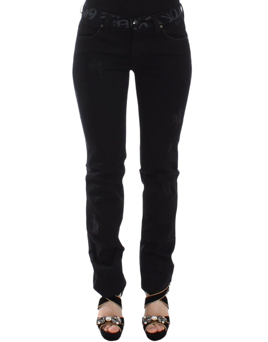 Pair of black skinny jeans with zipper detailing on legs