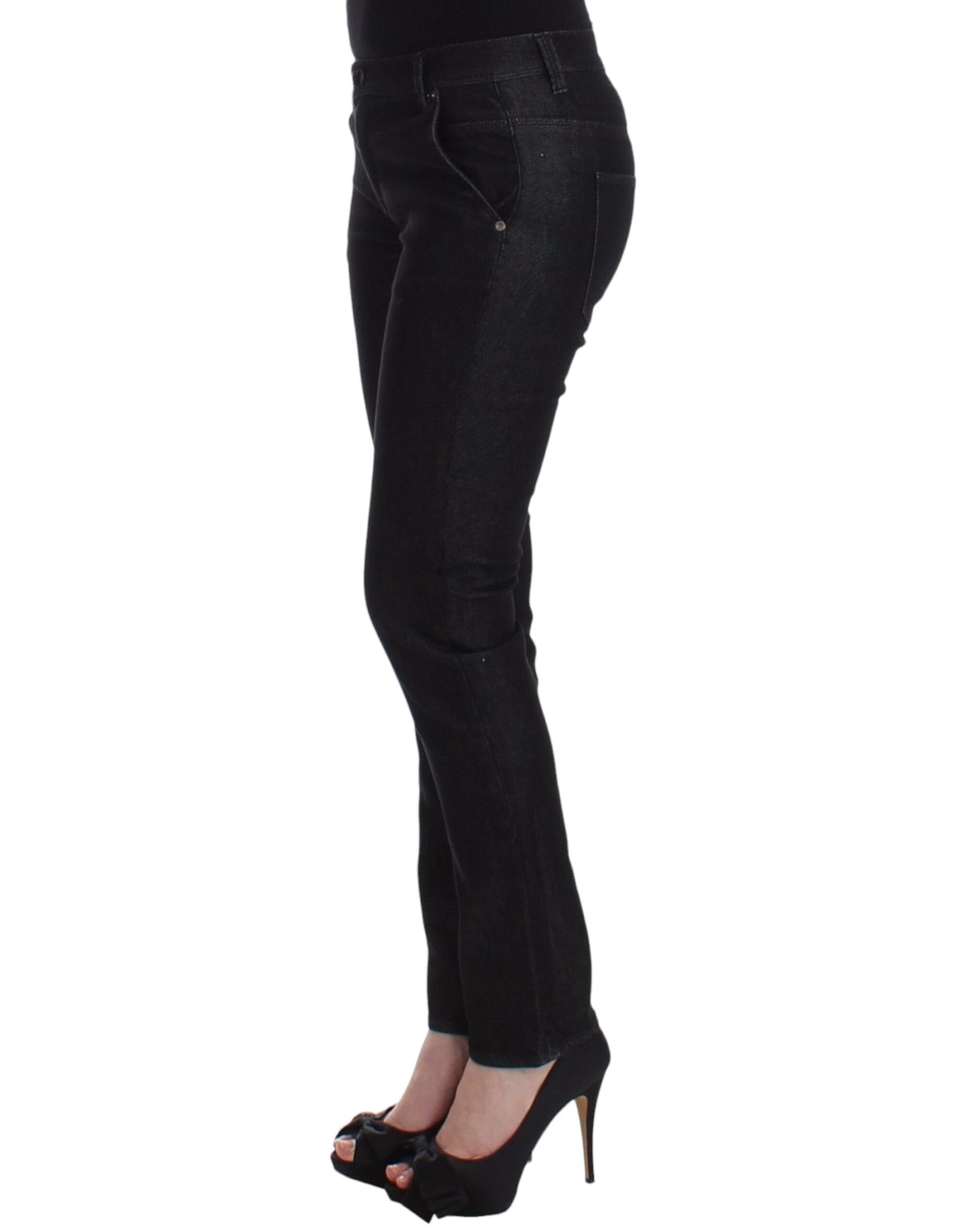 Woman wearing black pants and high heels