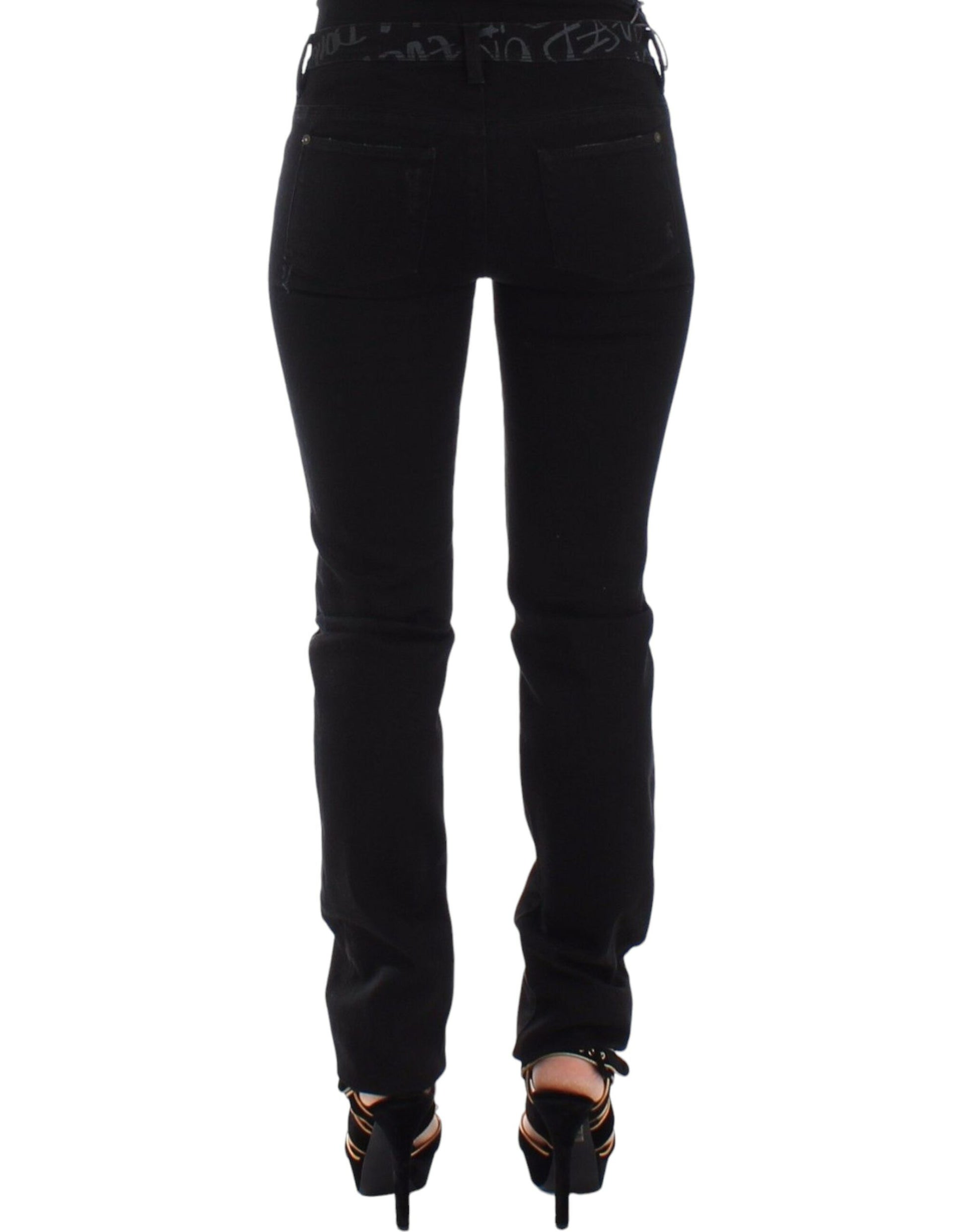 Pair of black skinny jeans with high waist and zipper detailing