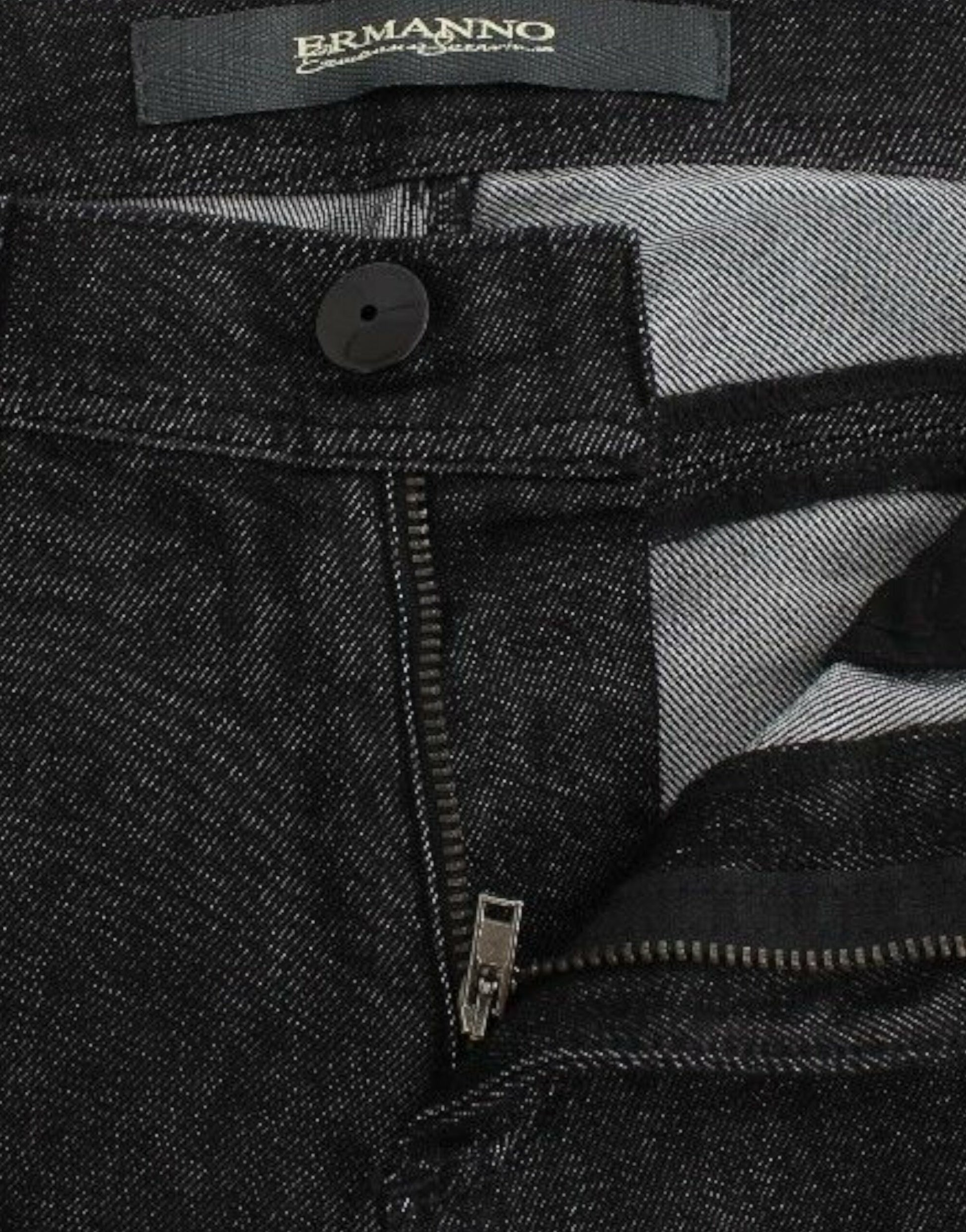 A pair of jeans with visible branding on the waistband and a zipper fly. The jeans appear to be made of denim fabric, whi