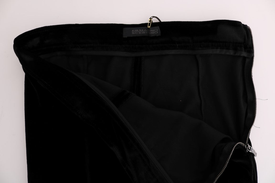 Black pants hanging on a hanger