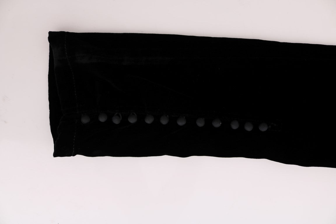 Black rectangular object with holes on one side