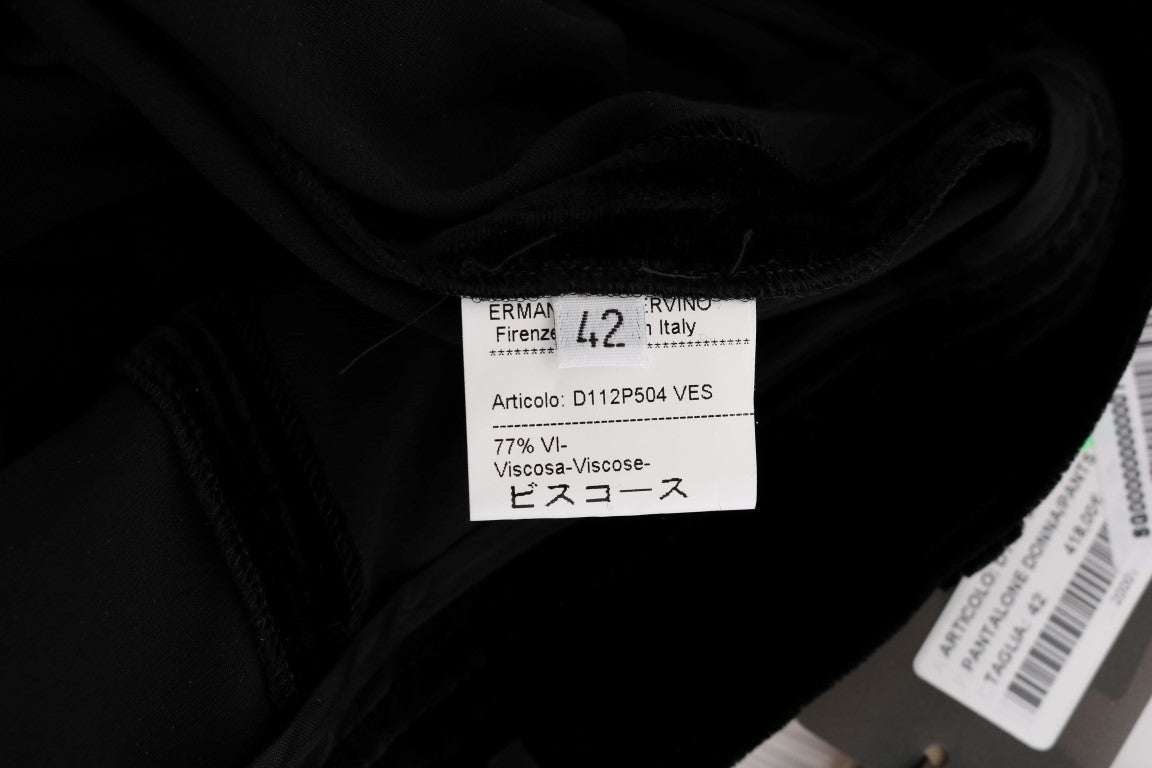 Clothes in a pile, tagged with numbers and letters