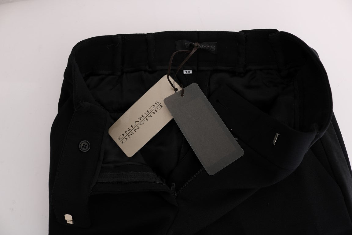 Black suitcase on table with tag attached to handle
