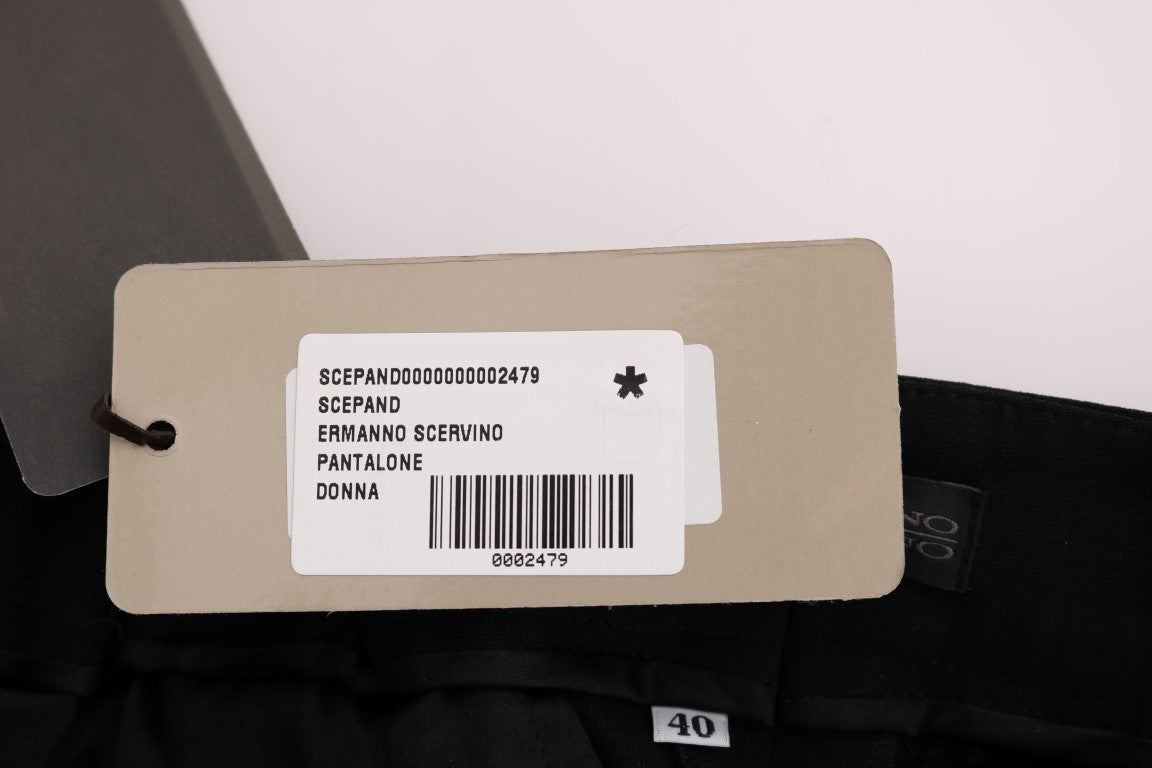 Brown paper tag on black pants