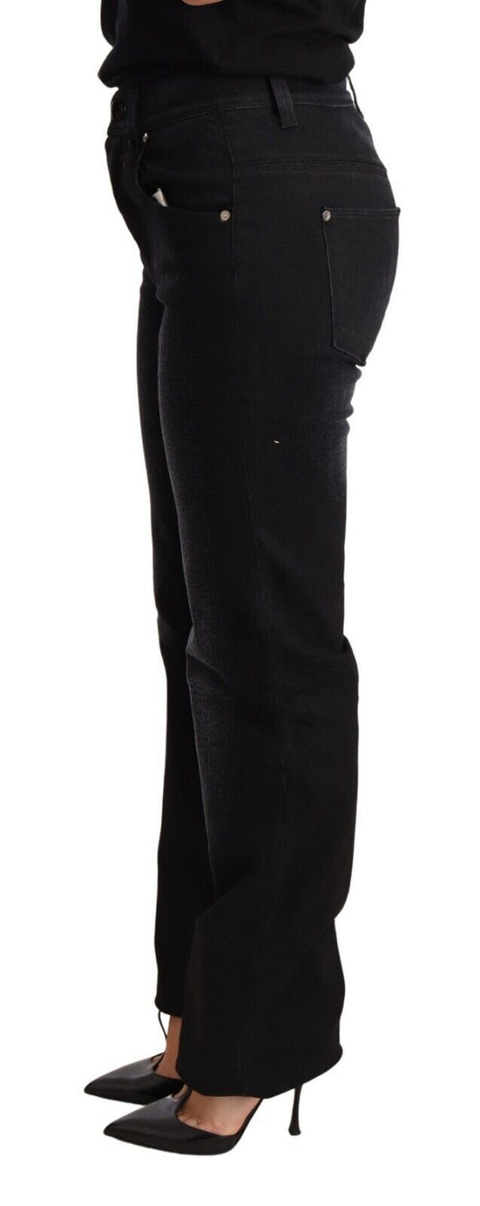 Woman wearing black pants and high heels