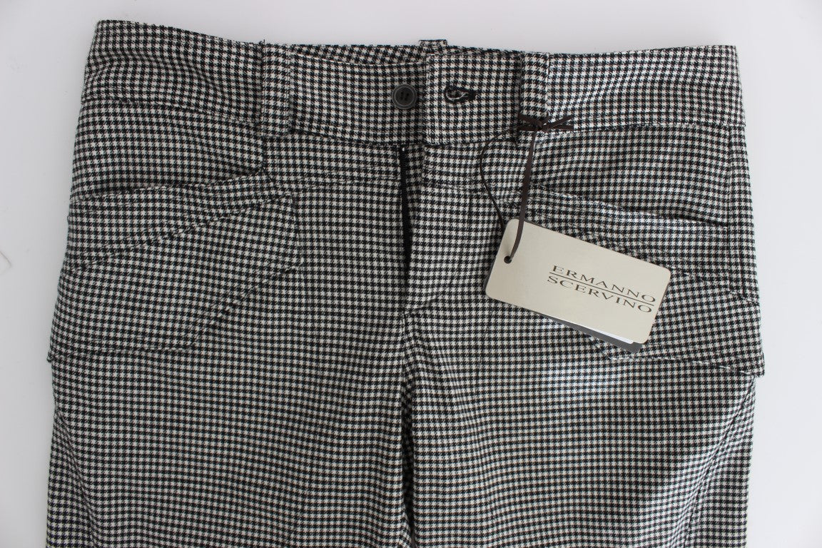 Pair of plaid shorts with a tag attached to them
