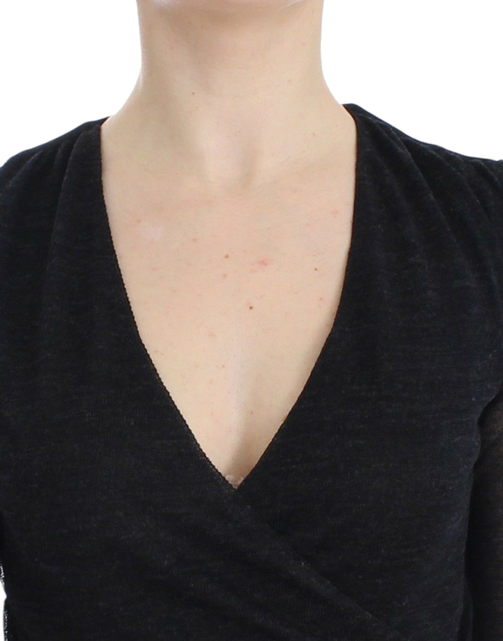 Woman wearing black top with scoop neckline