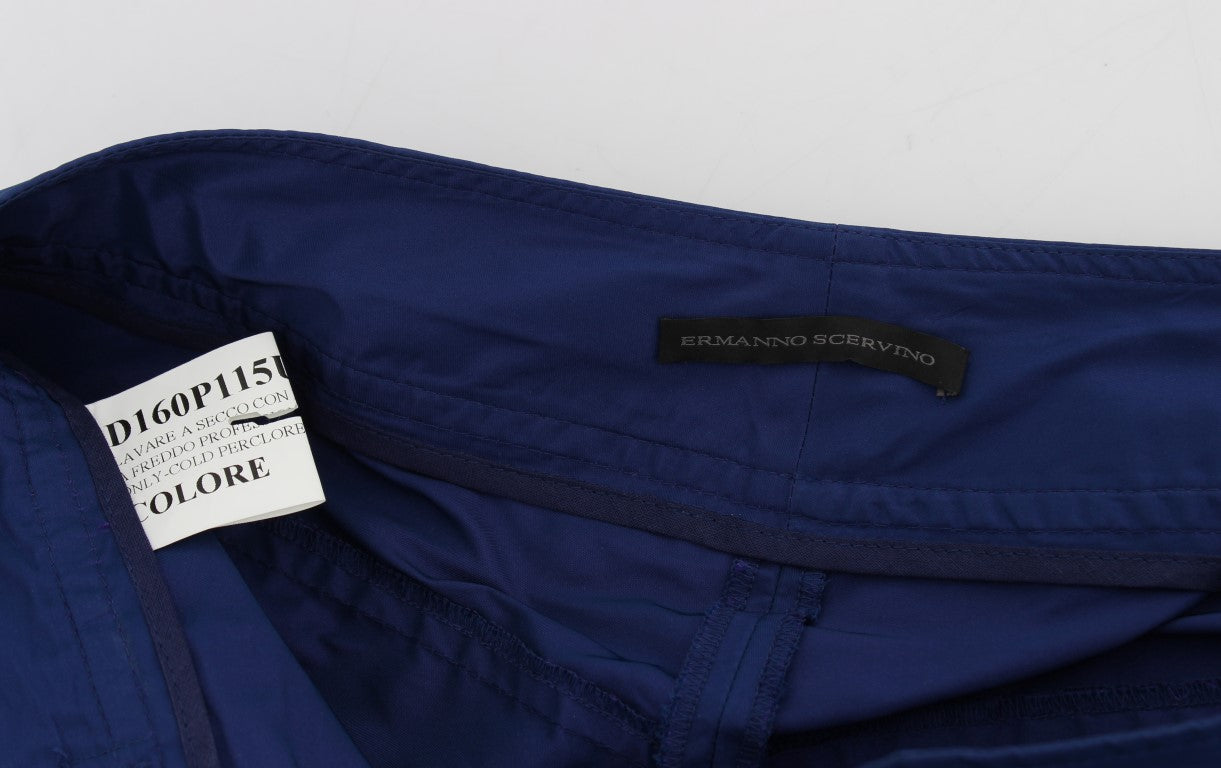 Blue pants on a white surface