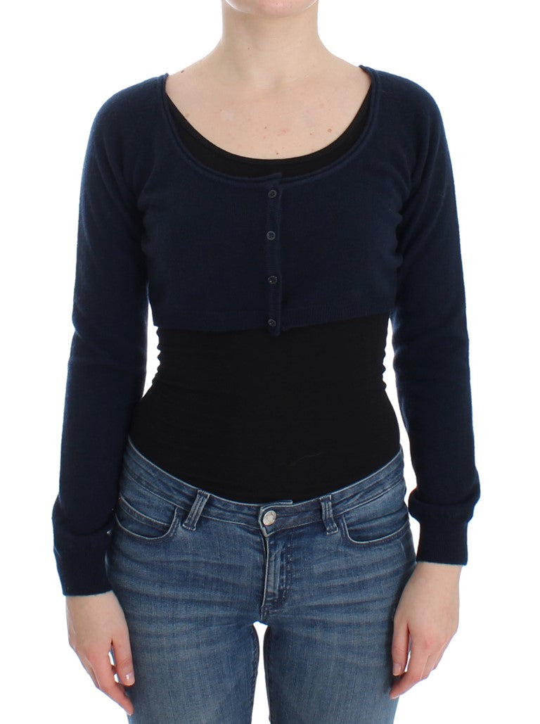 Woman wearing black sweater and blue jeans