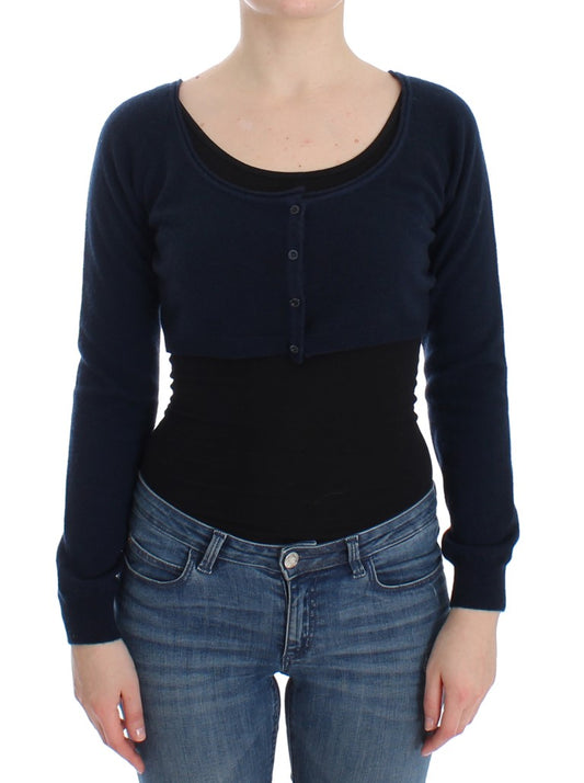 Woman wearing black sweater and blue jeans