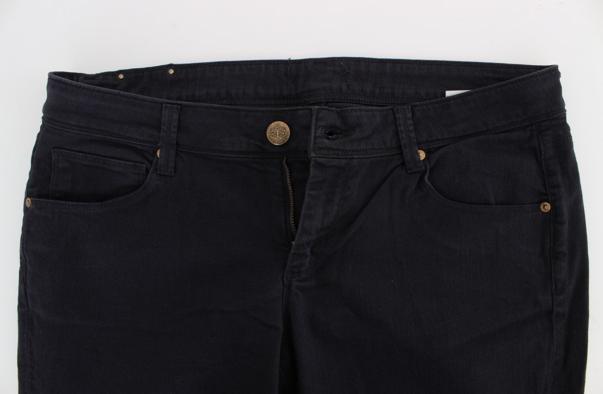 Dark blue denim jeans with button closure and two pockets