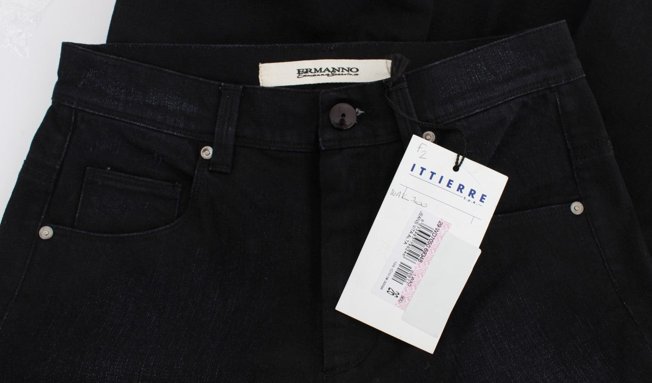 Pair of black jeans on a white background