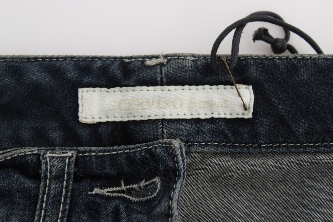Pair of blue jeans with white label on waistband