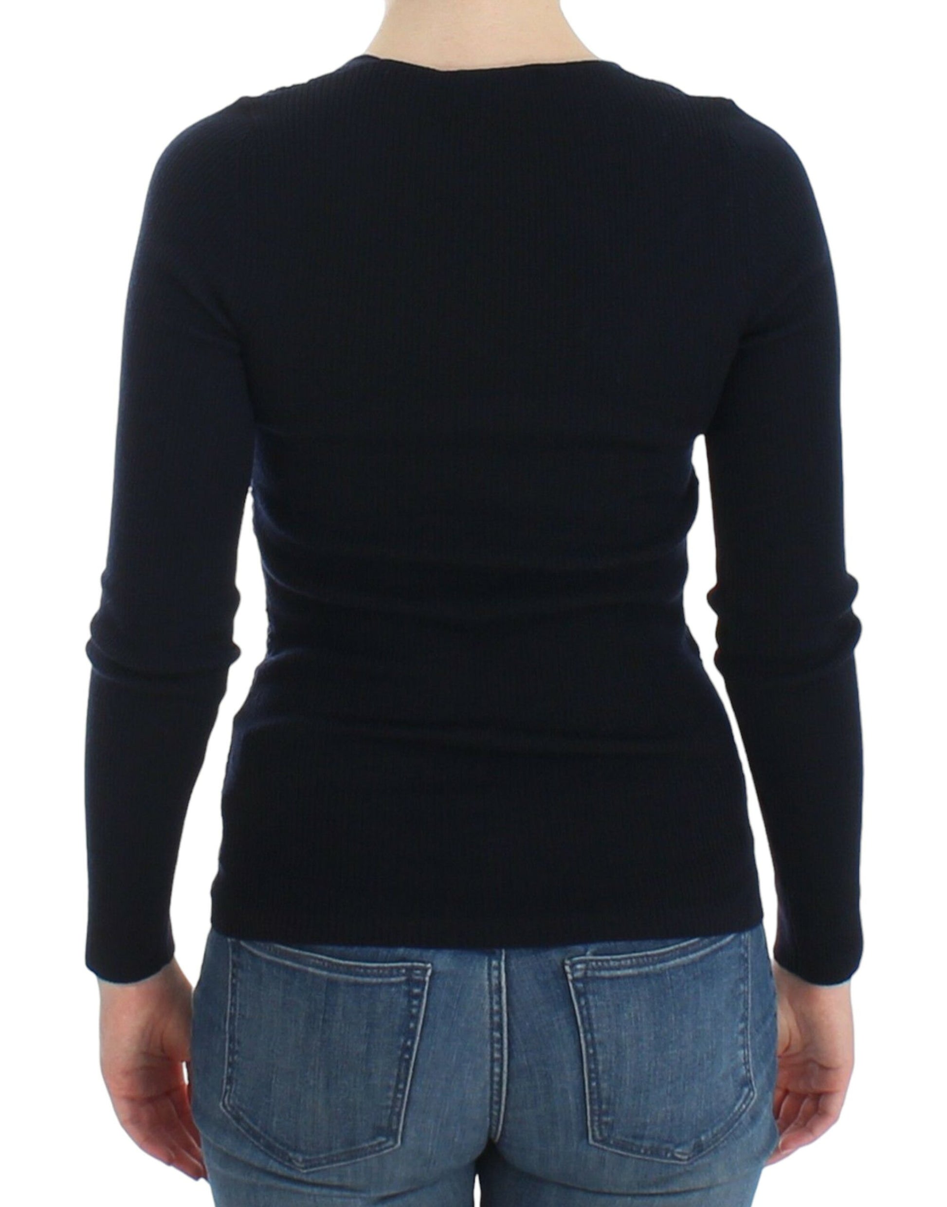 Black long sleeve sweater on a woman