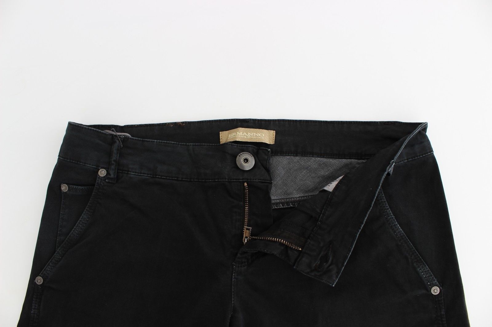 Pair of black jeans with button closure and zipper fly