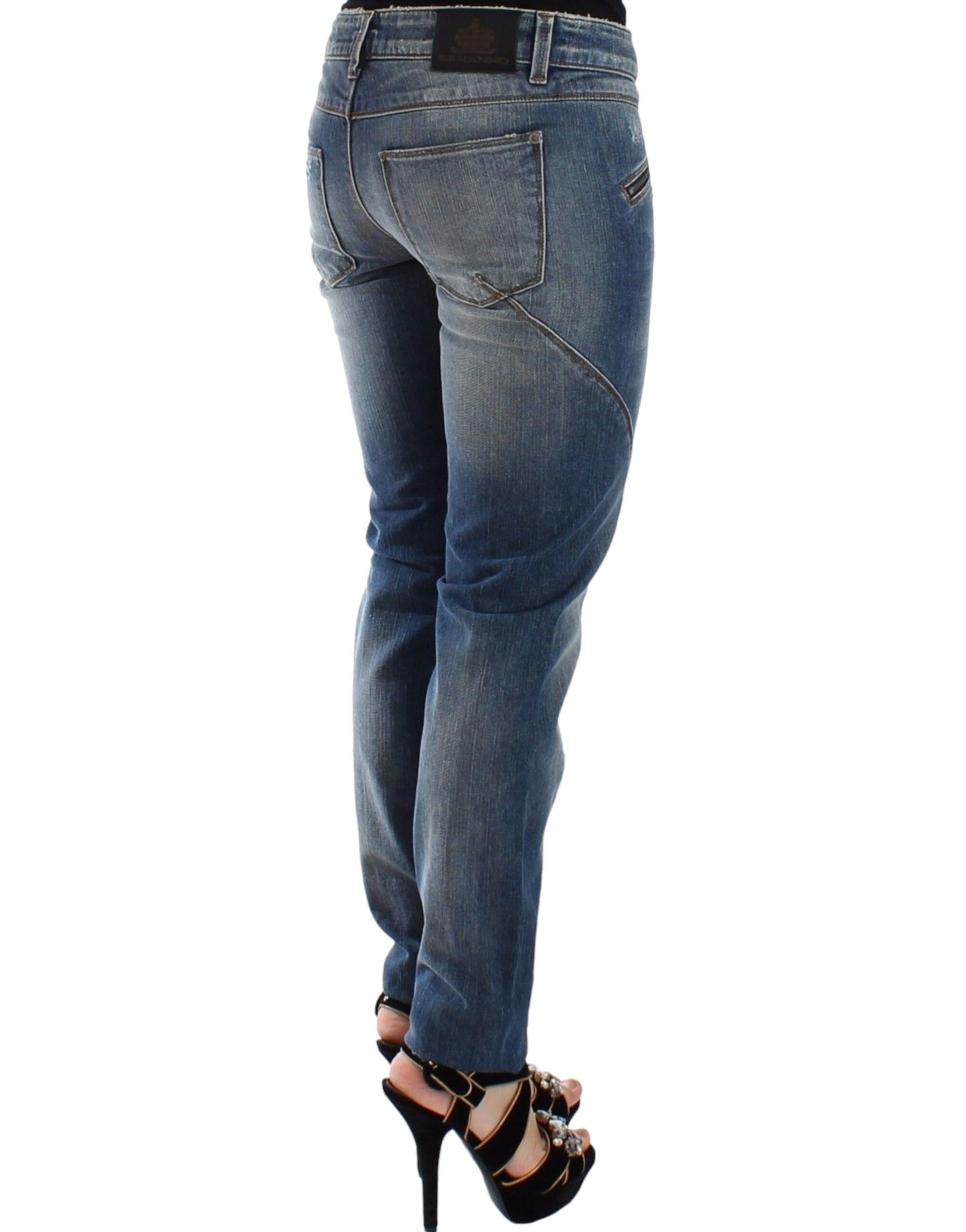 Woman wearing blue jeans and black high heels