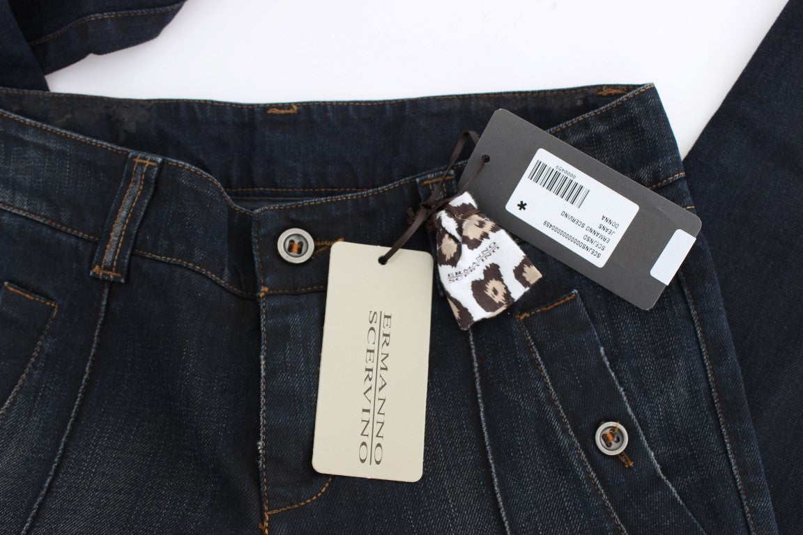 Pair of blue jeans with tag attached to waistband