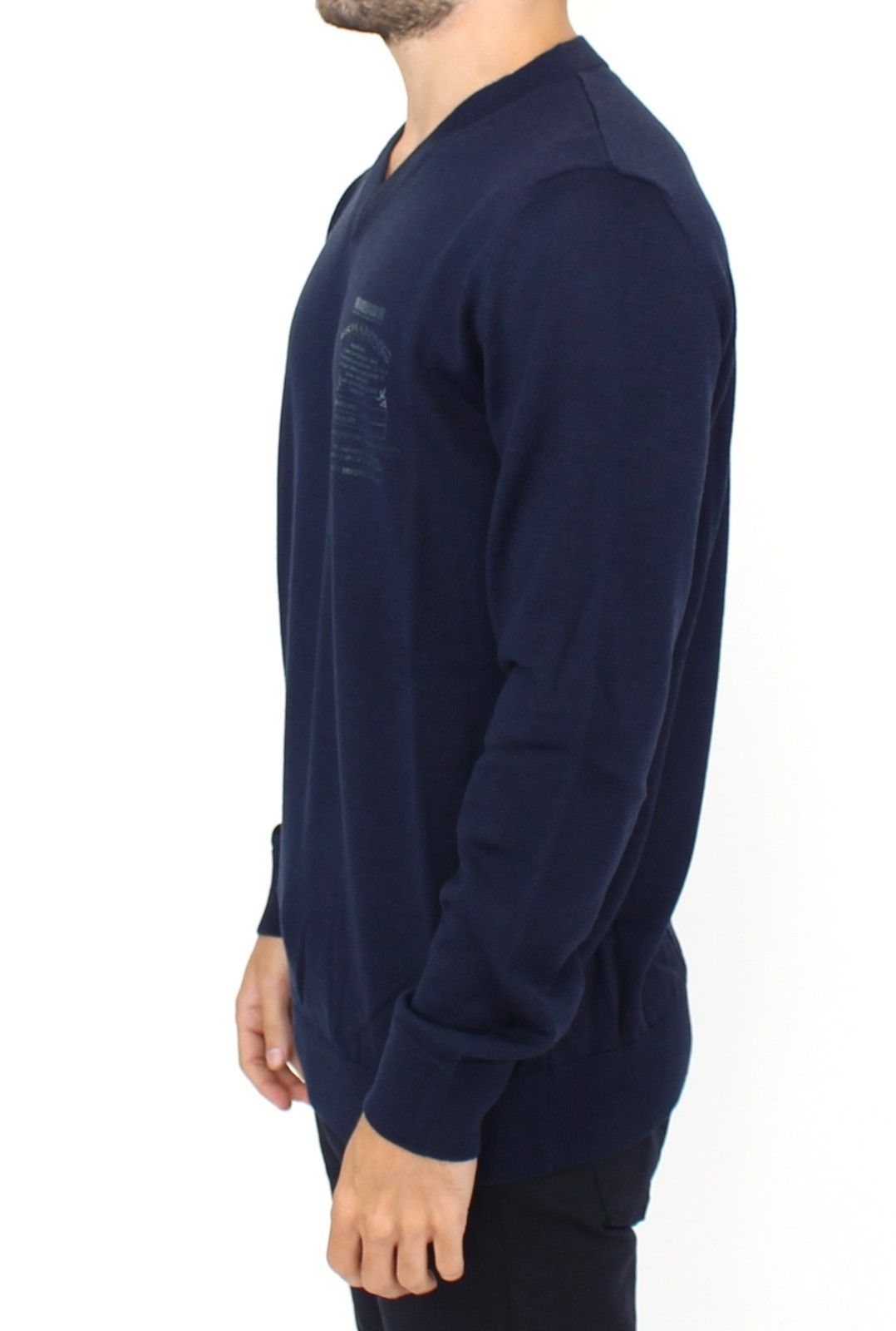Man wearing dark blue long sleeve shirt