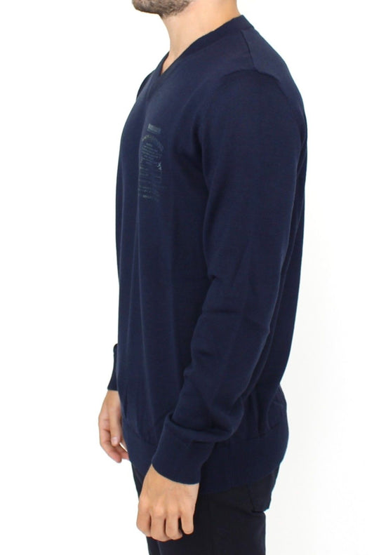 Man wearing dark blue long sleeve shirt