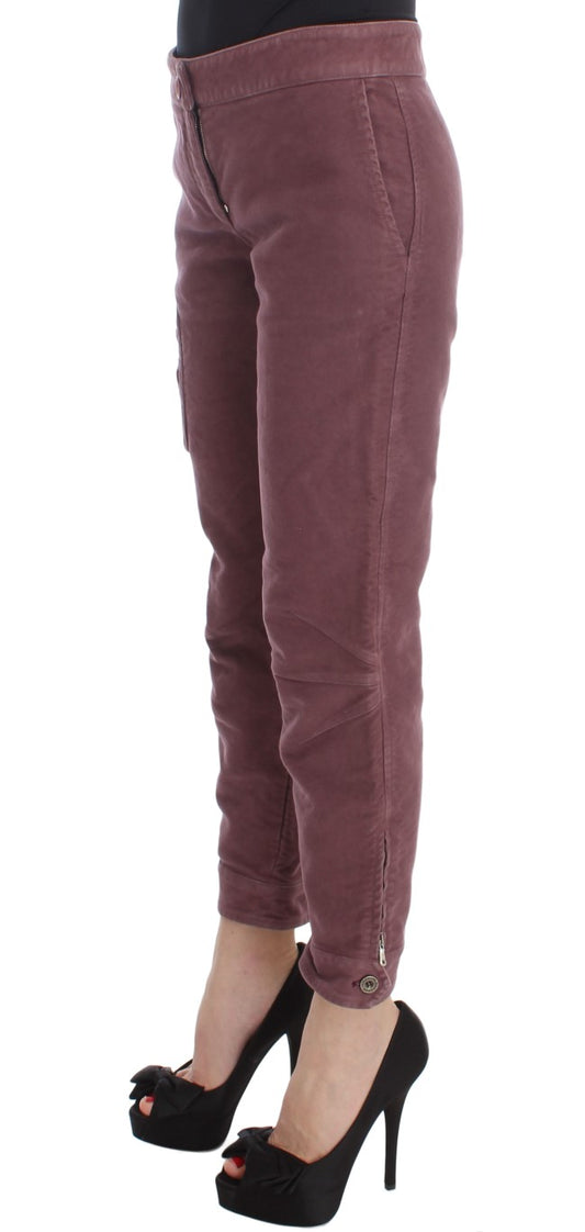 Pair of burgundy pants with rolled up legs