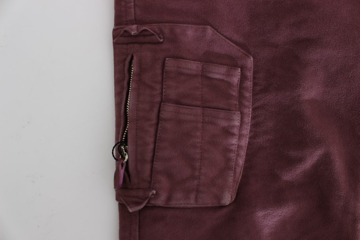 Purple velvet pants with zippered pocket on white surface