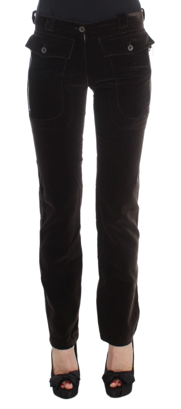 Pair of women's trousers in a dark color, possibly black or brown, with visible pockets and zippers