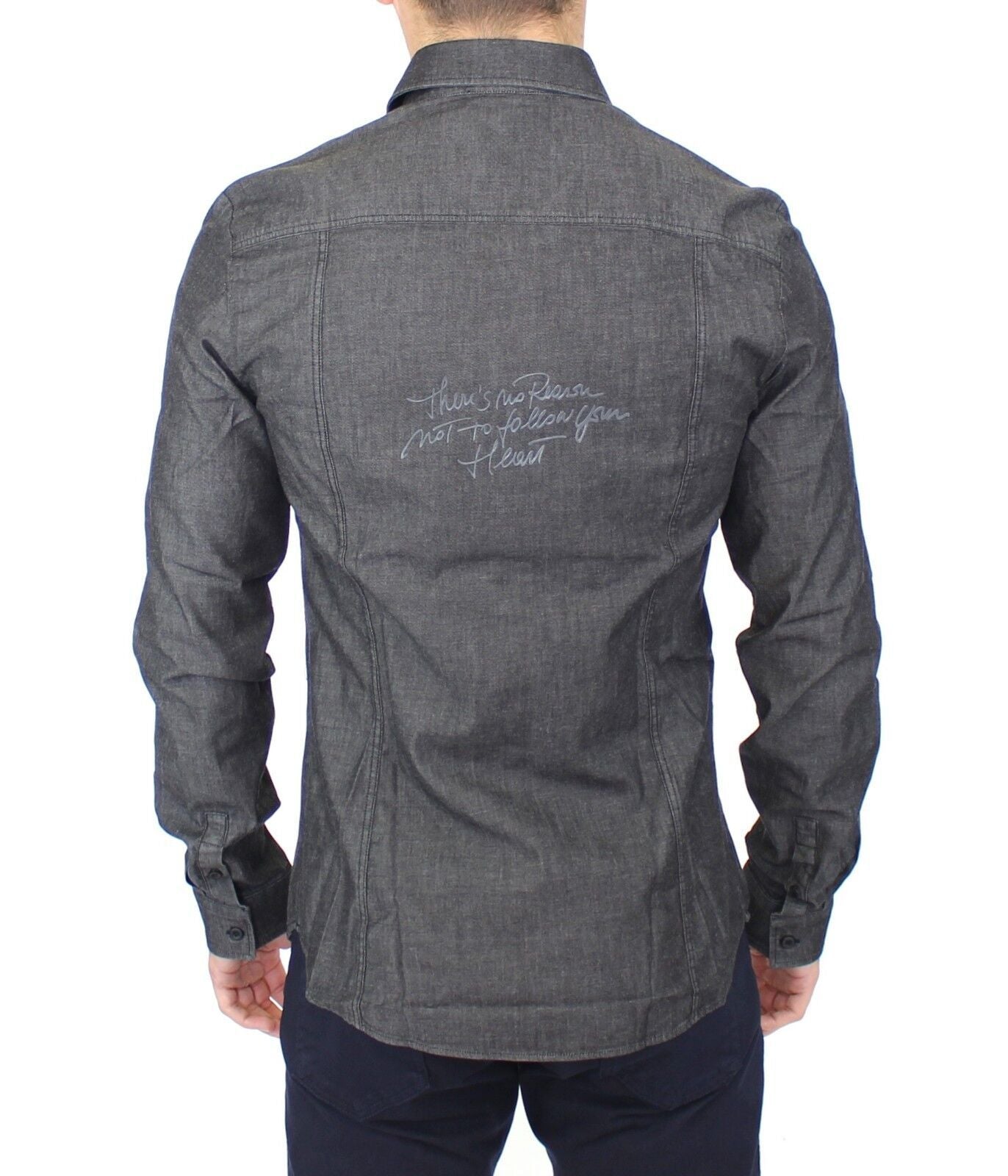 Man wearing dark denim jacket with autograph on back