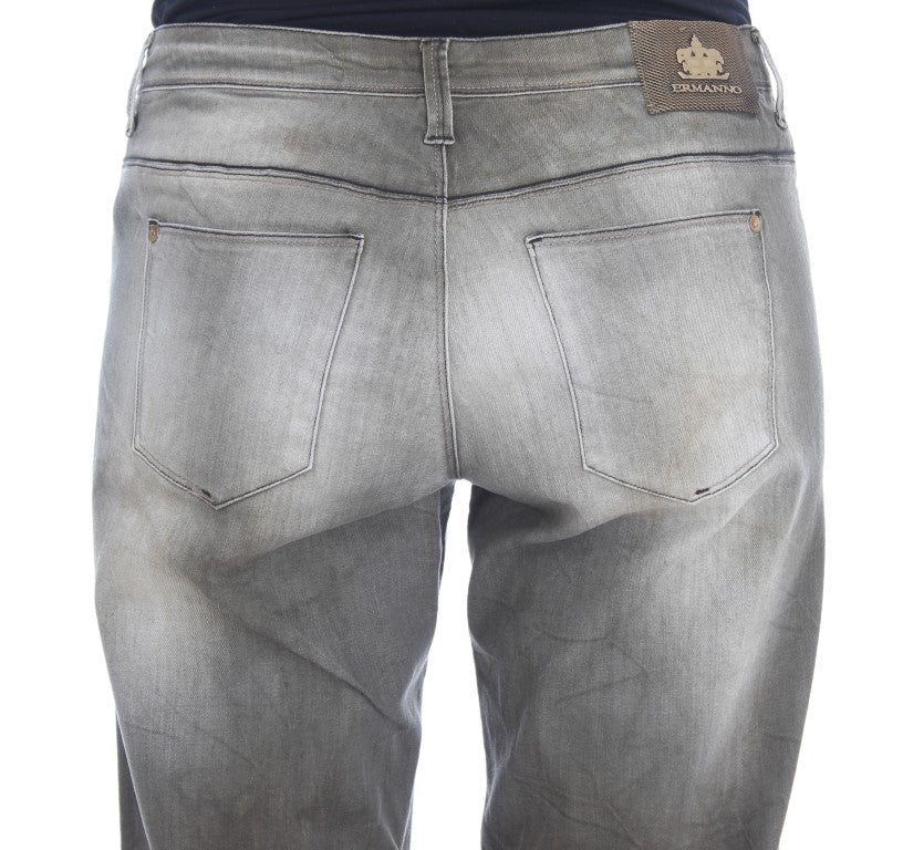 Pair of blue jeans with a brown patch on back pocket
