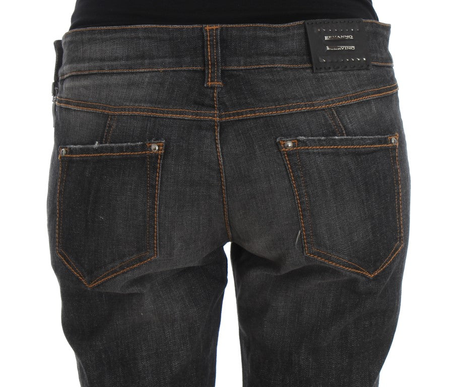 Pair of blue jeans with brown stitching on back pockets