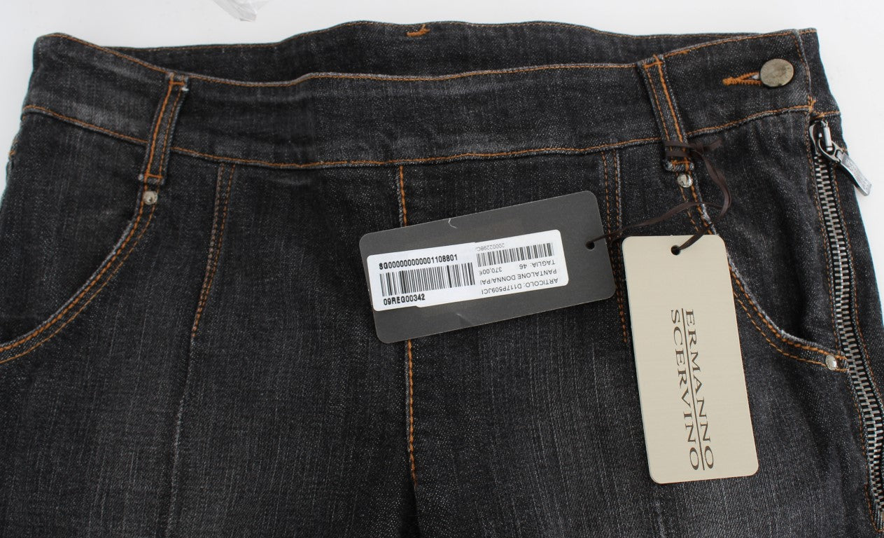 Pair of blue jeans with tag attached to waistband