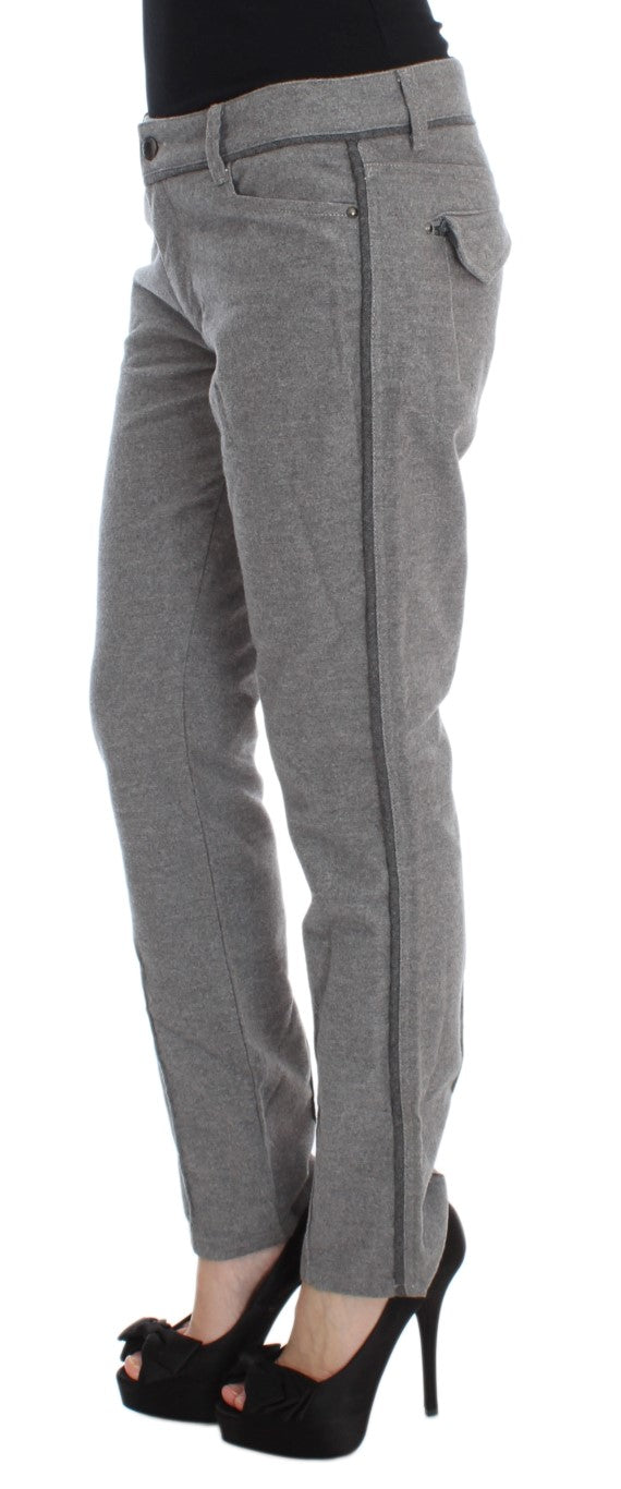 Pair of women's jeans with slim fit and zippered pockets