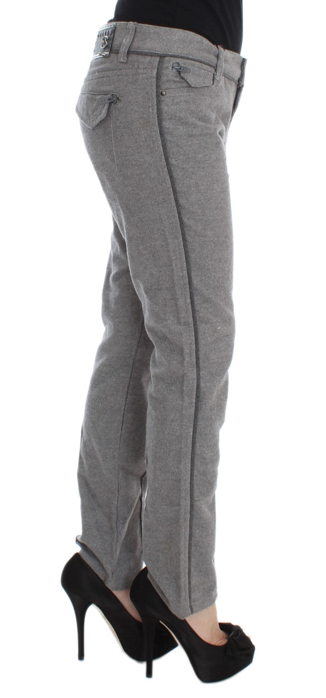 Pair of women's pants with side pockets and zipper detailing