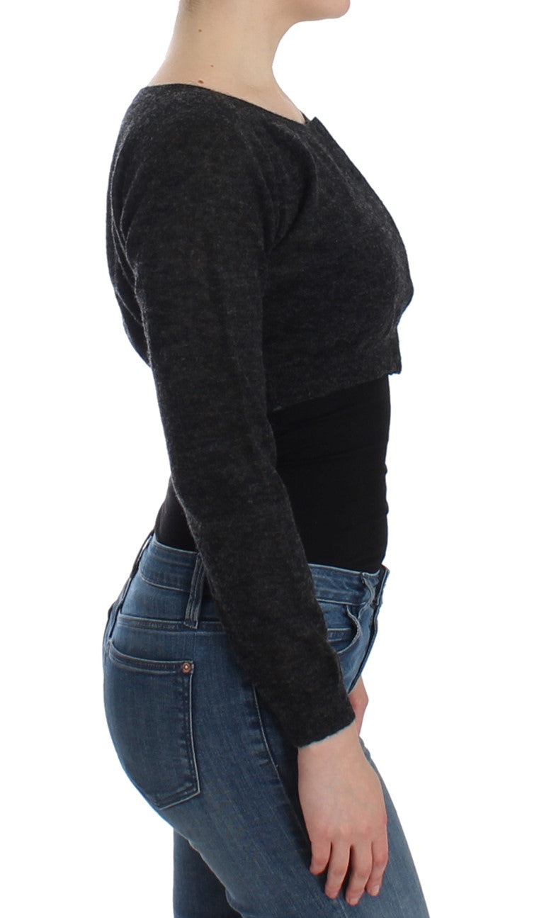 Woman wearing black top and blue jeans