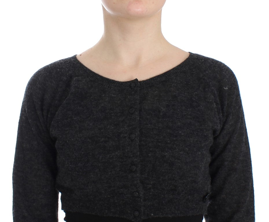 Black long sleeve sweater on a person