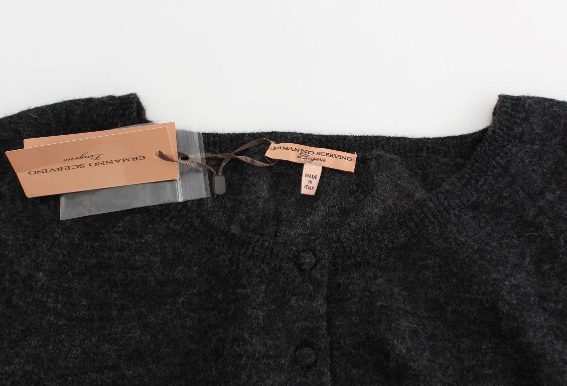 Black fabric with copper tags attached to it